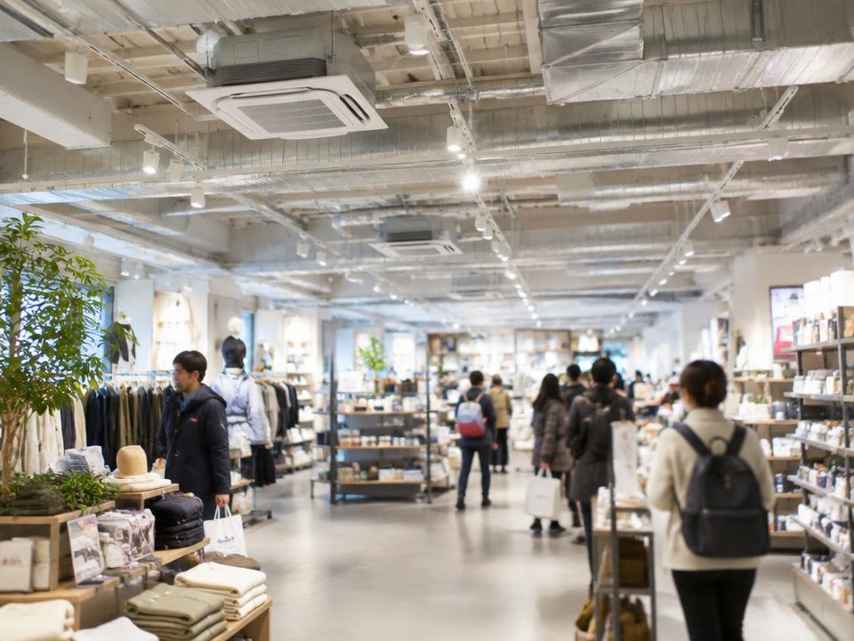 A busy retail store with ceiling-mounted HVAC units